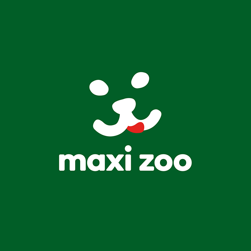 Logo représentant un visage stylisé d’animal en blanc avec une langue rouge, accompagné du texte « maxi zoo » sur fond vert.